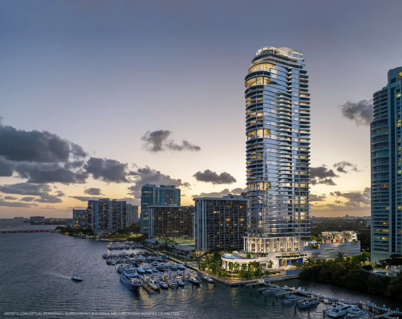 A waterfront Miami residential tower at dusk